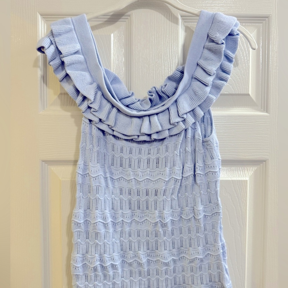 Baby blue Guess knit top. Off the shoulder. Size Large. Never worn. Tags on.